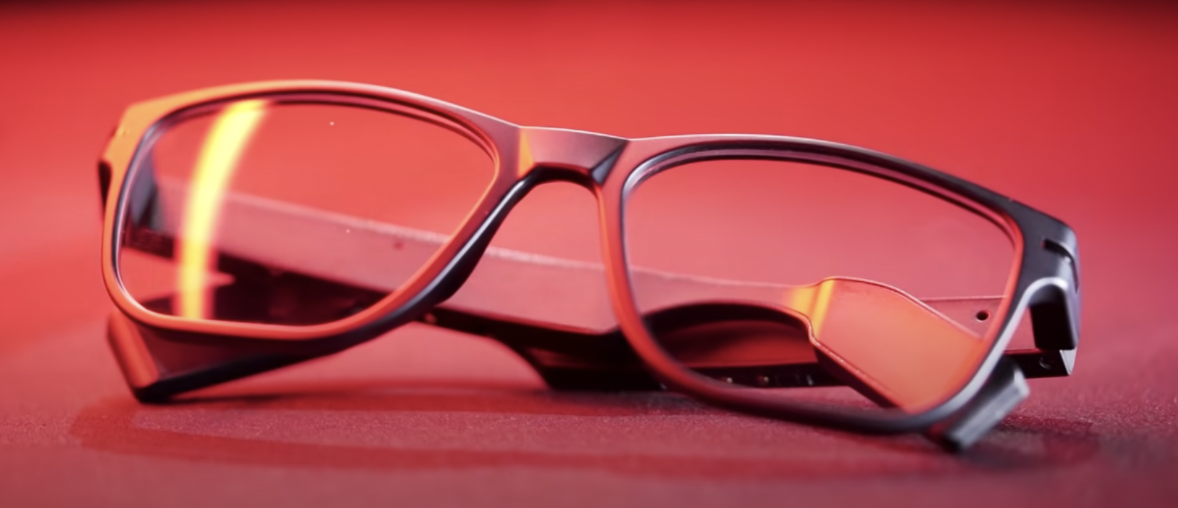 Titan EyeX glasses photographed under red studio light